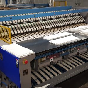 H J Weir 64 small-piece folder and in-line stacker.